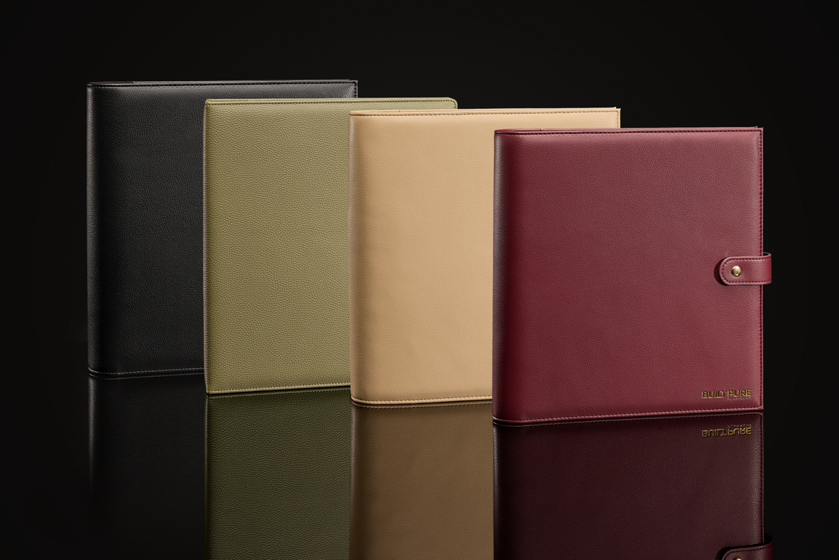 The four Built Pure Planner colourways together: Charcoal, Olive, Sandy beige, Burgundy